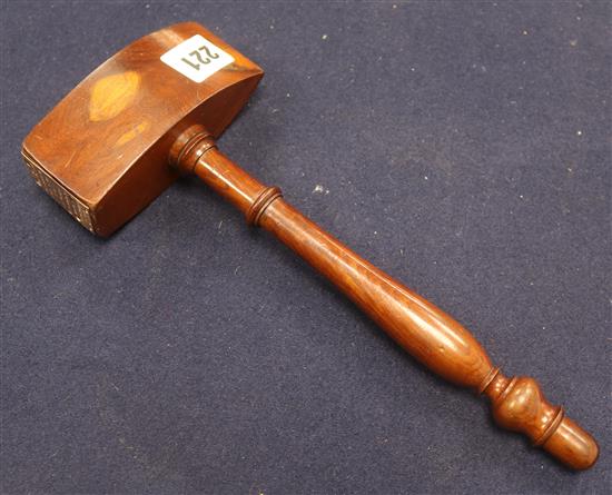 A gavel made from yew wood, taken from HMS Victoria 1893, with 9ct gold engraved plaque.